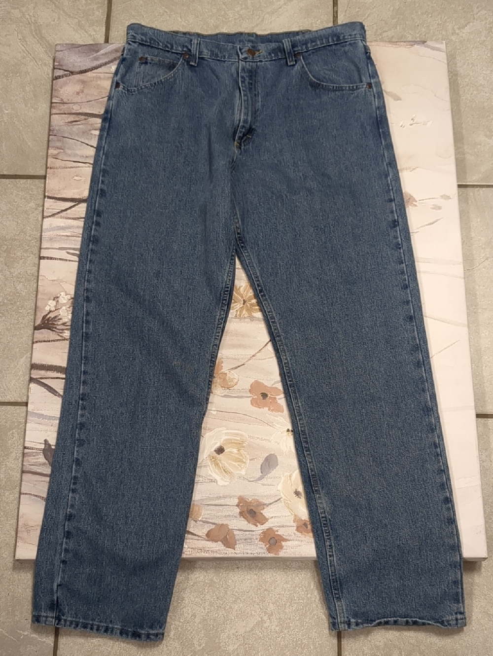 Wrangler denim jeans in blue with red brand tab